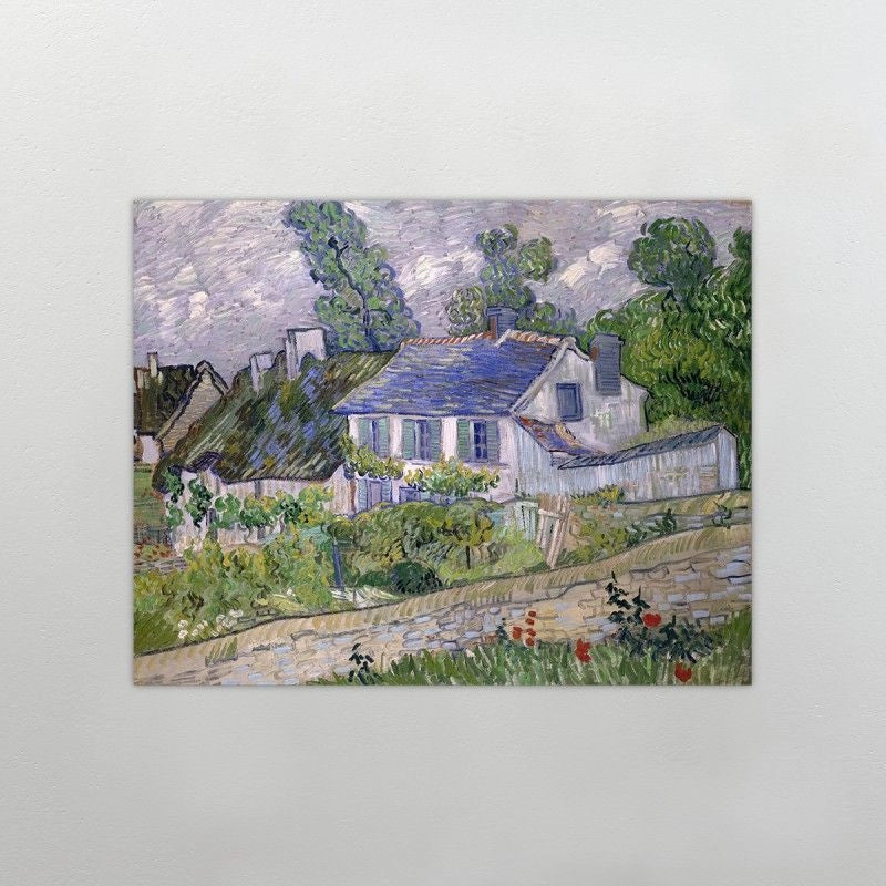 Cuadro de van gogh casas en auvers en una pared gris